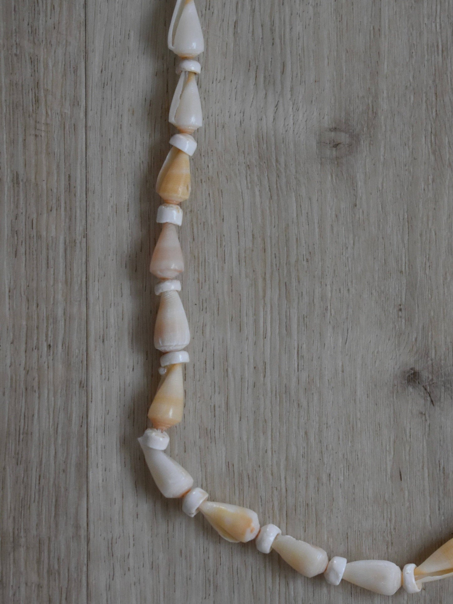 Cream Cone Shell + Puka Shell Lei