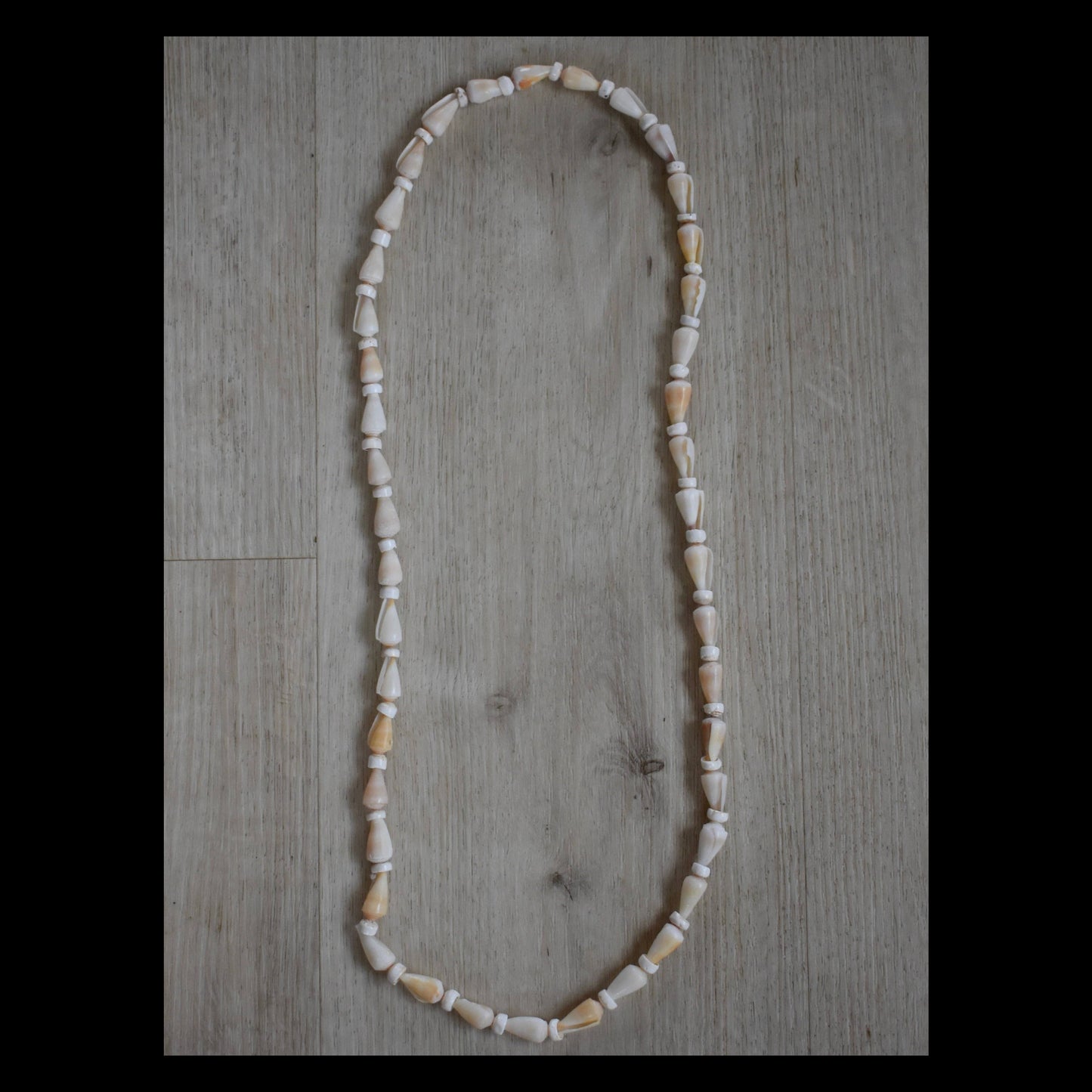 Cream Cone Shell + Puka Shell Lei